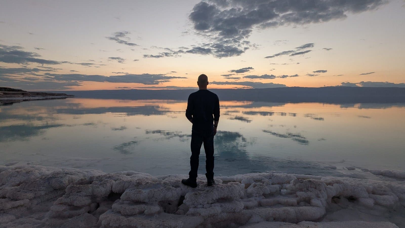 Symbolic wide illustration representing Nietzsche philosophy showing thinker facing horizon of light